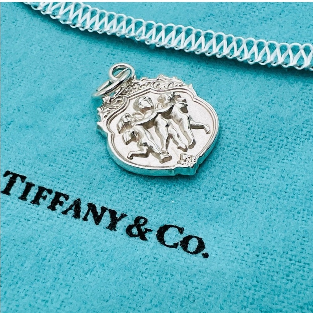 Rare Tiffany& Co. Charm “ Joy” silver 925